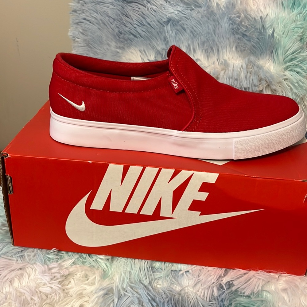 Women’s size 7.5 Nike red court shoe